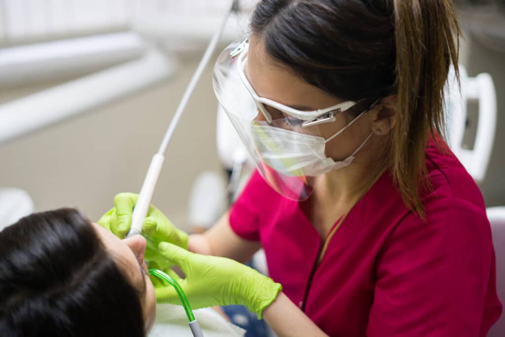 Deep dental cleaning for a patient