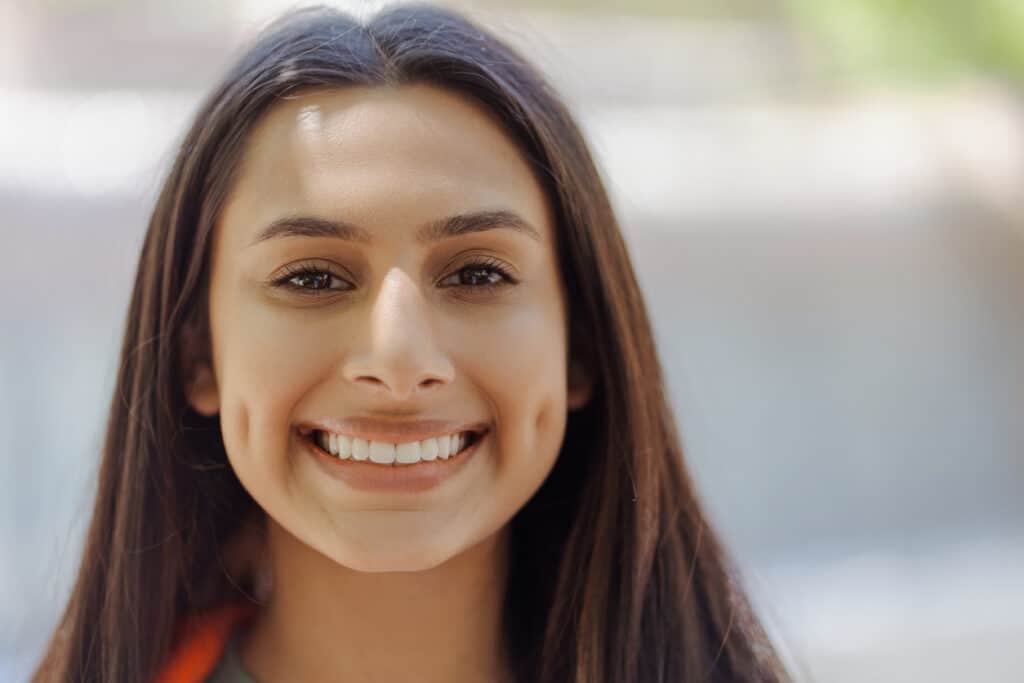 Dental patient smiling with a healthy straight smile