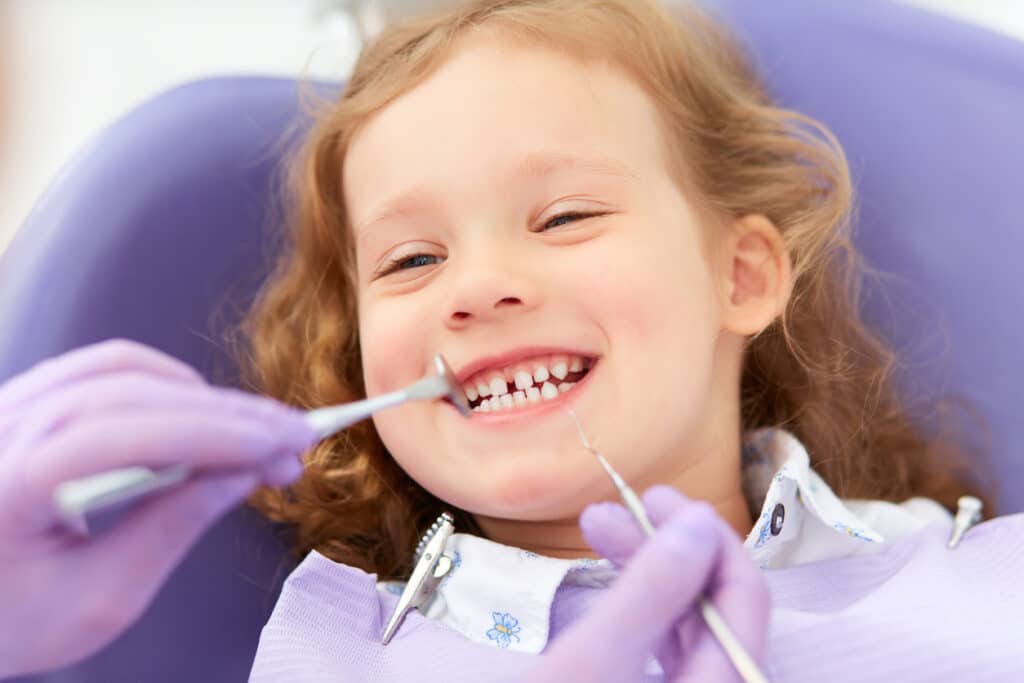 pediatric dental patient with a healthy smile